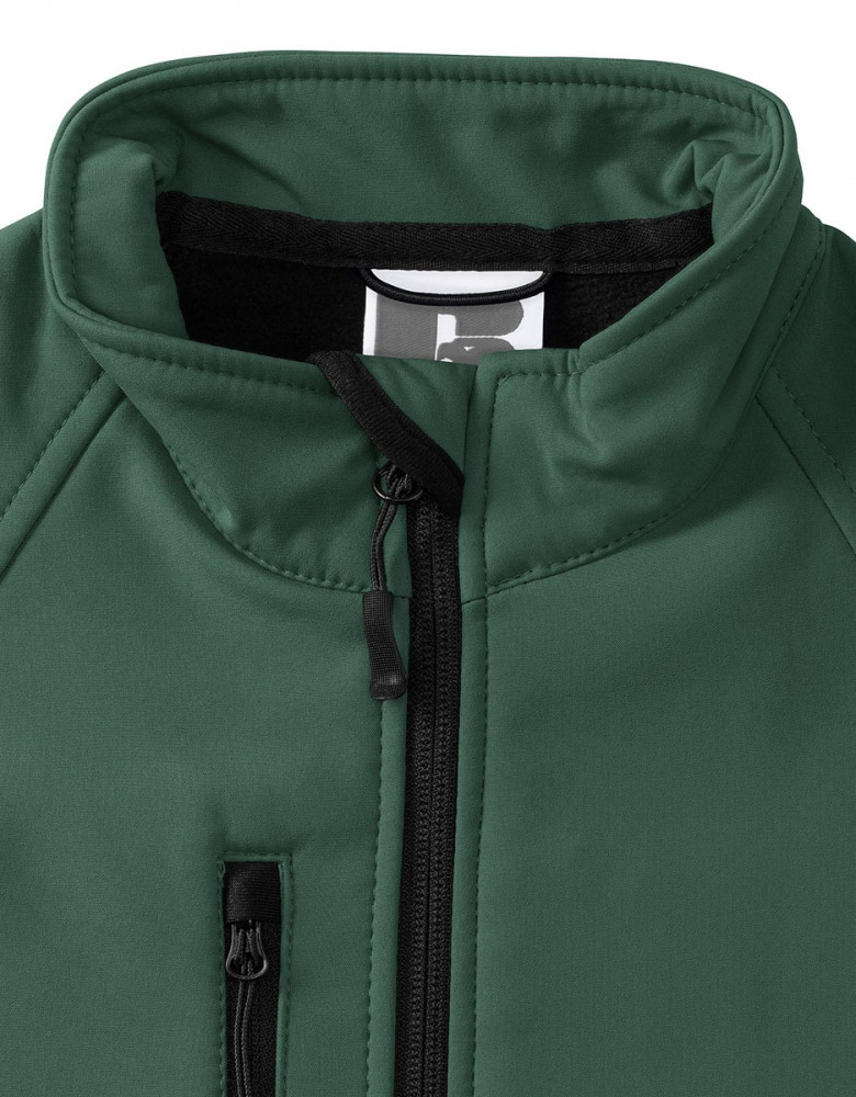 Grüne Softshelljacke für Damen mit Slim-Fit-Passform, wetterfest und atmungsaktiv – ideal für Outdoor, Arbeit oder Teambekleidung.