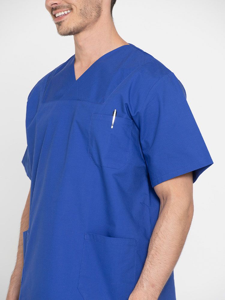 Unisex Pflegekasack in Blau mit Taschen – COMO Deluxe Serie, bequem, hygienisch waschbar, ideal für Pflegepersonal und medizinisches Fachpersonal